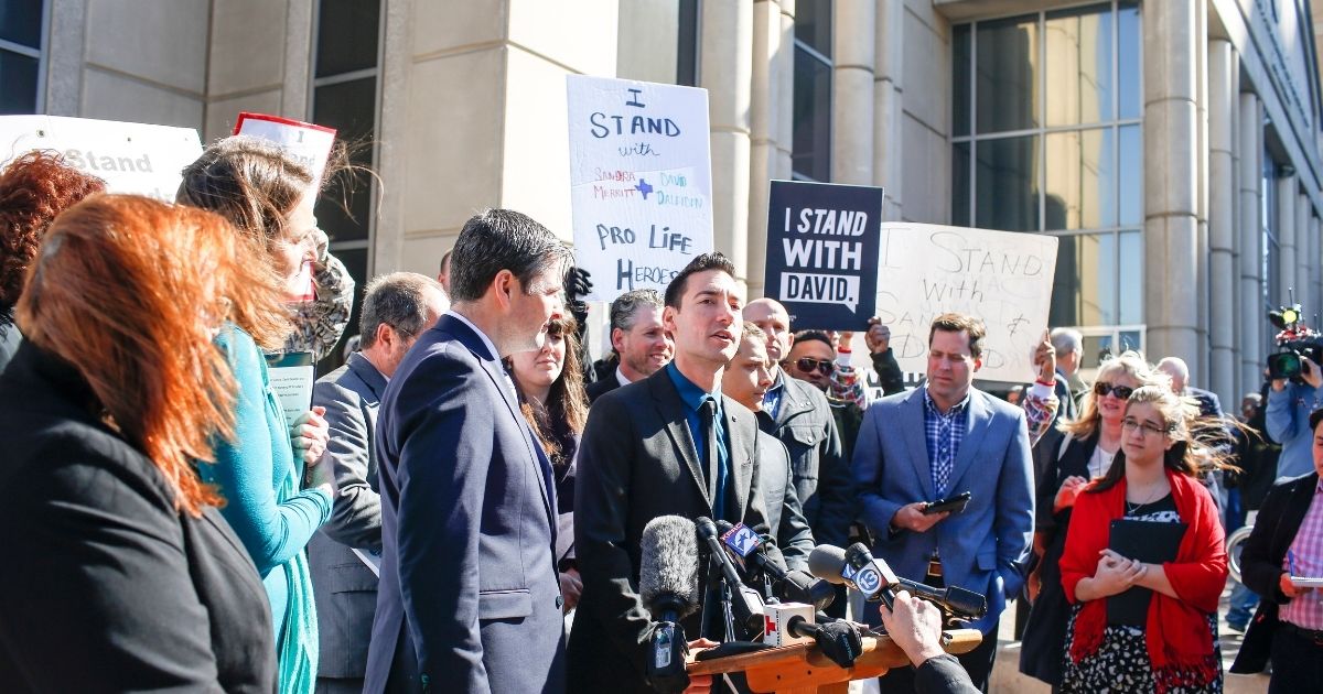 HOUSTON, TX - FEBRUARY 04: David Daleiden, a defendant in an indictment stemming from a Planned Parenthood video he helped produce, speaks to the media after appearing in court at the Harris County Courthouse on February 4, 2016 in Houston, Texas. Daleiden is facing an indictment on a misdemeanor count of purchasing human organs, and along with defendant Sandra Merritt, is charged with tampering with a governmental record.