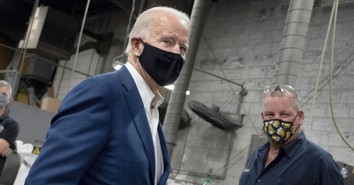 Democratic presidential nominee Joe Biden visits an aluminum plant Monday in Manitowac, Wisconsin.