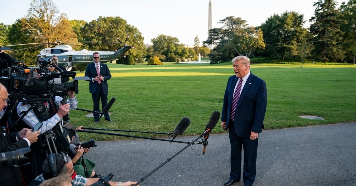 WASHINGTON, DC - SEPTEMBER 22: U.S. President Donald Trump stops and takes questions from reporters on his way to Marine One on the South Lawn of the White House on September 22, 2020 in Washington, DC. President Trump is traveling to Pittsburgh, Pennsylvania for a campaign event.