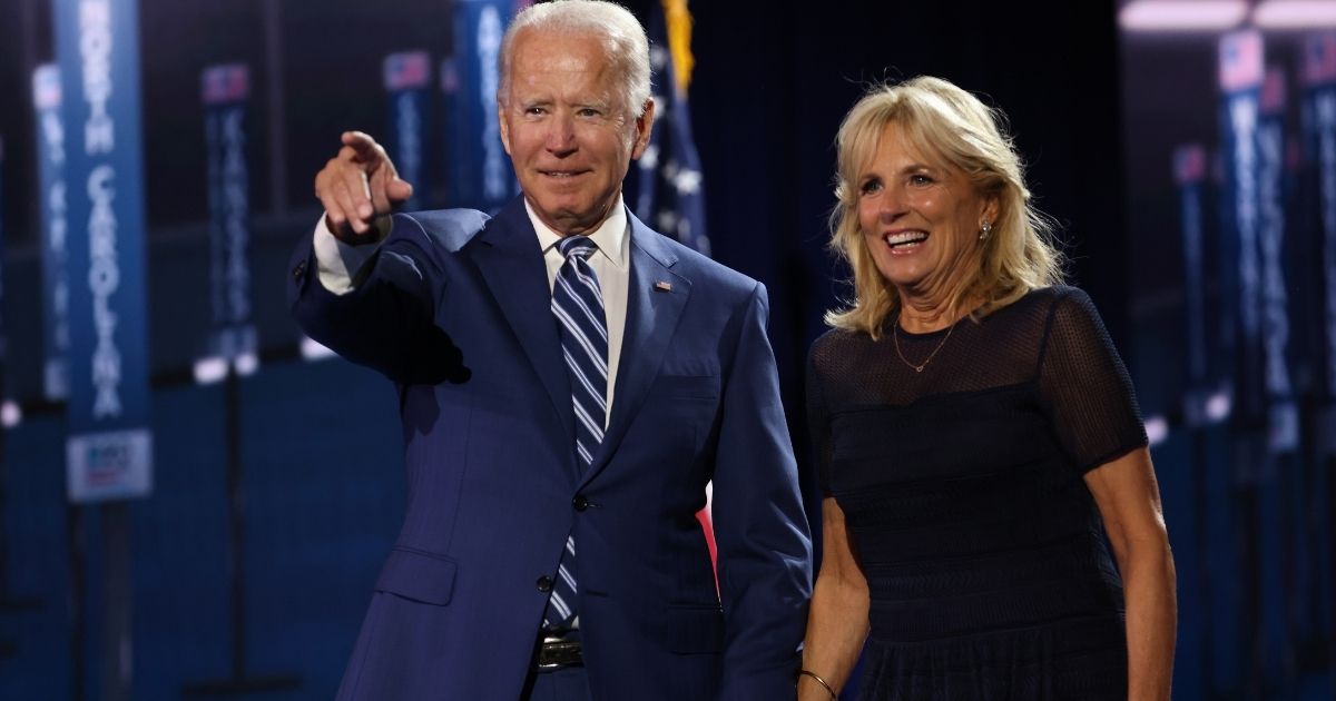 WILMINGTON, DELAWARE - AUGUST 19: Democratic presidential nominee Joe Biden and his wife Dr. Jill Biden appear on stage after Democratic vice presidential nominee U.S. Sen. Kamala Harris (D-CA) spoke on the third night of the Democratic National Convention from the Chase Center August 19, 2020 in Wilmington, Delaware. The convention, which was once expected to draw 50,000 people to Milwaukee, Wisconsin, is now taking place virtually due to the coronavirus pandemic. Harris is the first African-American, first Asian-American, and third female vice presidential candidate on a major party ticket.
