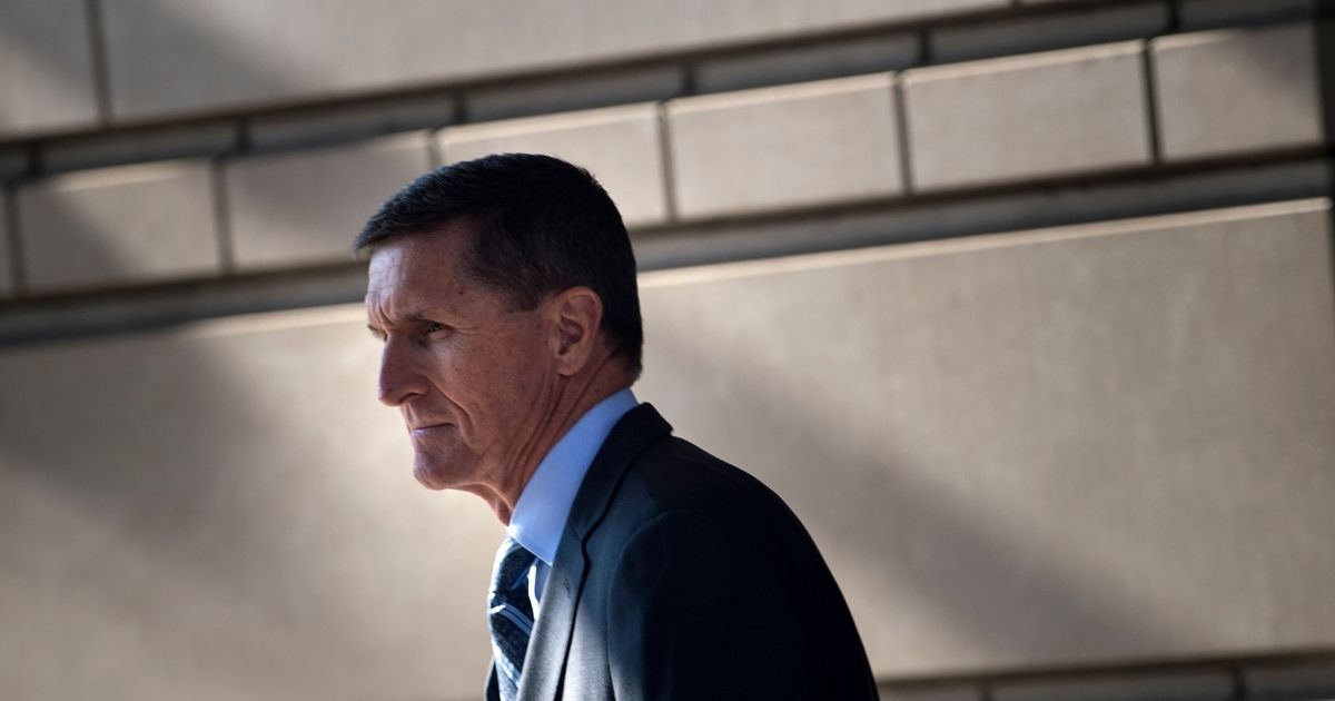 Gen. Michael Flynn, former national security adviser to US President Donald Trump, leaves Federal Court December 1, 2017 in Washington, DC. - Donald Trump's former national security advisor Michael Flynn appeared in court Friday after being charged with lying over his Russian contacts, as part of the FBI's probe into possible collusion between the Trump campaign and Moscow.Ex-Trump aide Flynn says he recognizes his actions 'were wrong'.