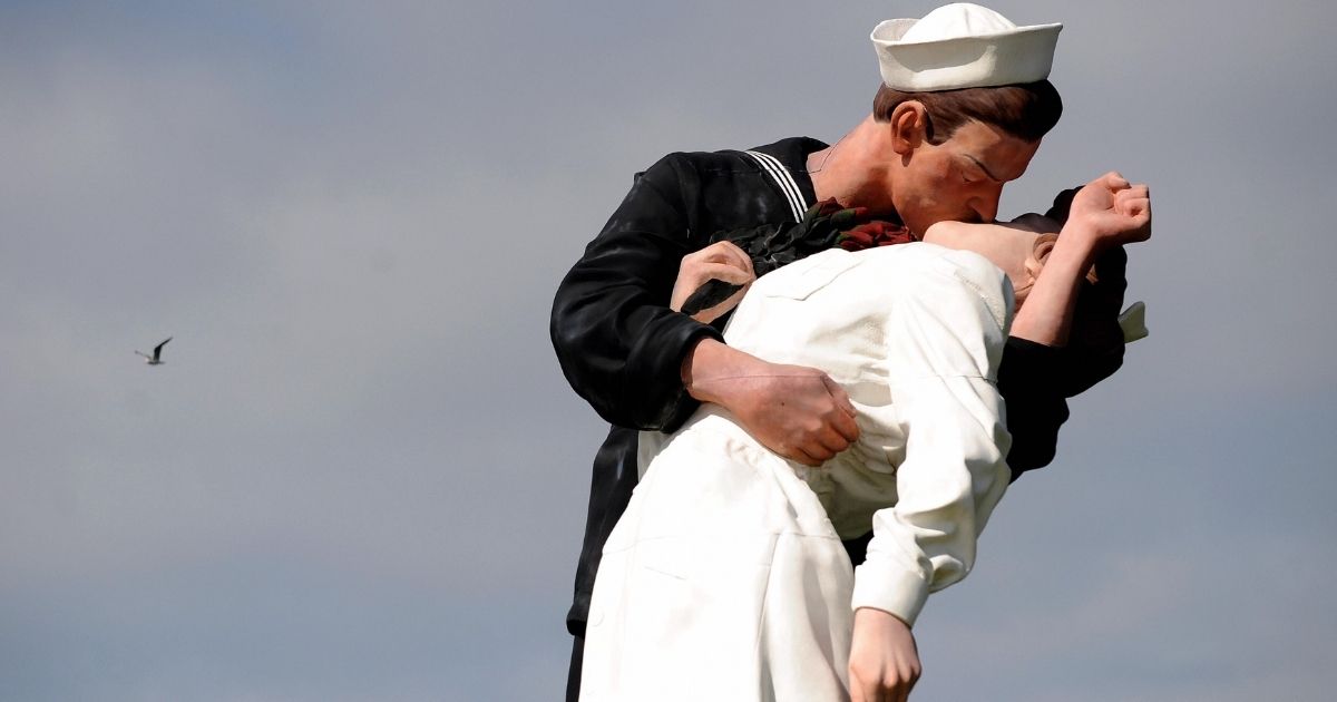 View of a sculpture by J. Seward Johnson on March 4, 2009 in San Diego, California. The 25-foot high sculpture is based on the famous photo by German American photographer Alfred Eisenstaedt, of a sailor kissing a nurse in Times Square, New York City, while celebrating the declaration of victory at the end of World War II. on August 14, 1945, that was originally published in Life magazine.