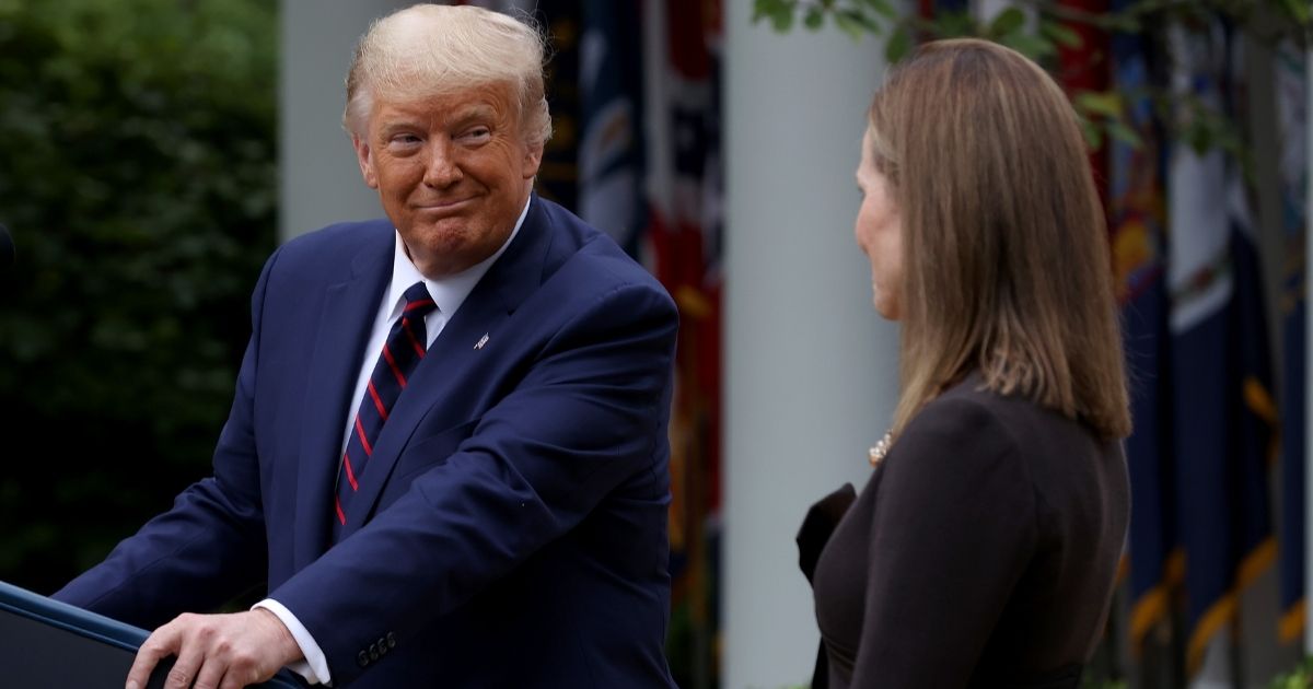 WASHINGTON, DC - SEPTEMBER 26: U.S. President Donald Trump announces 7th U.S. Circuit Court Judge Amy Coney Barrett as his nominee to the Supreme Court in the Rose Garden at the White House September 26, 2020 in Washington, DC. With 38 days until the election, Trump tapped Barrett to be his third Supreme Court nominee in just four years and to replace the late Associate Justice Ruth Bader Ginsburg, who will be buried at Arlington National Cemetery on Tuesday.