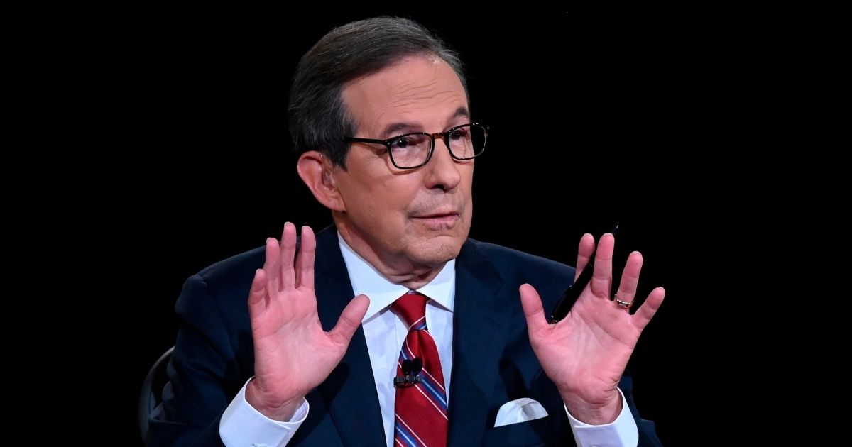 Moderator Chris Wallace of Fox News speaks as President Donald Trump and Democratic presidential candidate former Vice President Joe Biden participate in the first presidential debate Tuesday at Case Western University and Cleveland Clinic, in Cleveland.