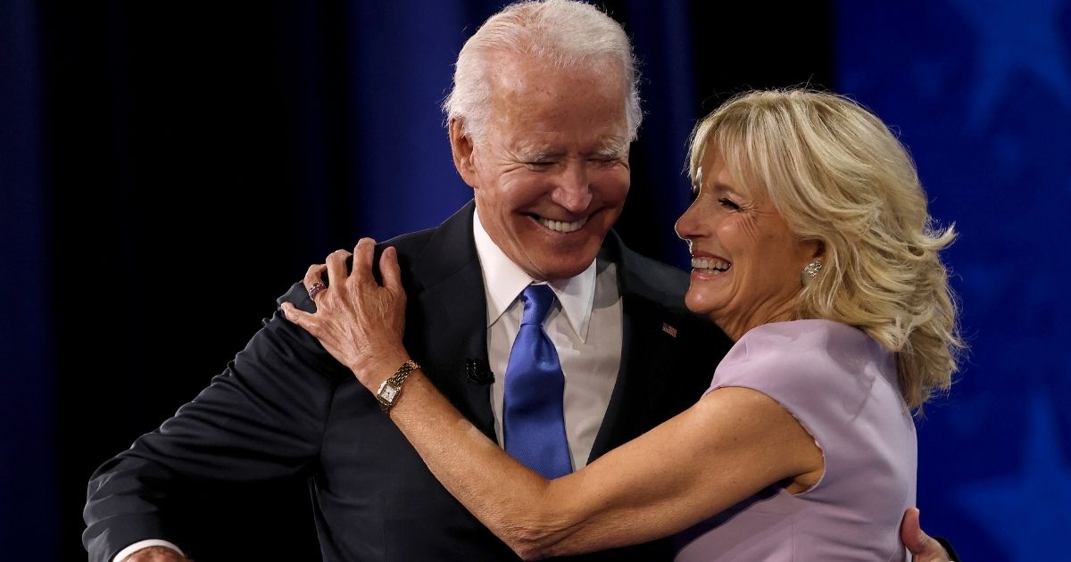 WILMINGTON, DELAWARE - AUGUST 20: : Democratic presidential nominee Joe Biden greets his wife Dr. Jill Biden on the fourth night of the Democratic National Convention from the Chase Center on August 20, 2020 in Wilmington, Delaware. The convention, which was once expected to draw 50,000 people to Milwaukee, Wisconsin, is now taking place virtually due to the coronavirus pandemic.