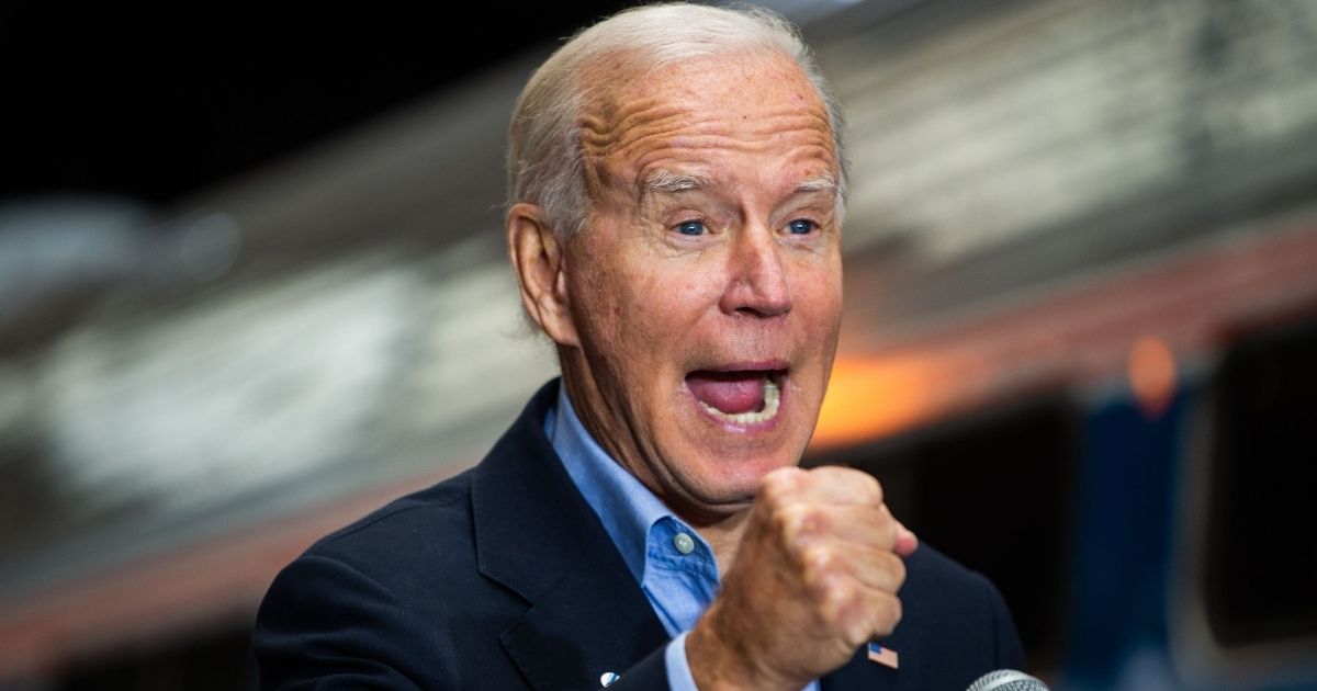 Democratic presidential candidate Joe Biden speaks at the Pittsburgh train station in Pittsburgh, Pennsylvania, on September 30, 2020, during a train campaign tour. - Biden on Wednesday branded his presidential rival's caustic debate performance as a "national embarrassment" for not addressing concerns of everyday Americans and failing to clearly denounce white supremacist groups.