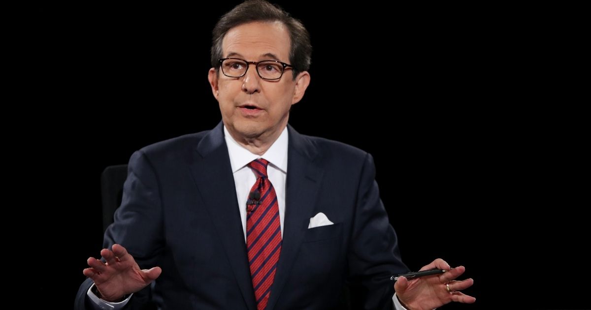 LAS VEGAS, NV - OCTOBER 19: Fox News anchor and moderator Chris Wallace asks the candidates a question during the third U.S. presidential debate at the Thomas & Mack Center on October 19, 2016 in Las Vegas, Nevada. Tonight is the final debate ahead of Election Day on November 8.