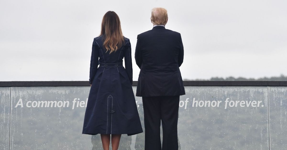 US President Donald Trump and First Lady Melania Trump arrive at the site of a new memorial on September 11, 2018 in Shanksville, Pennsylvania, where Flight 93 crashed during the September 11 attacks, as somber ceremonies take place at Ground Zero in New York and at the Pentagon.