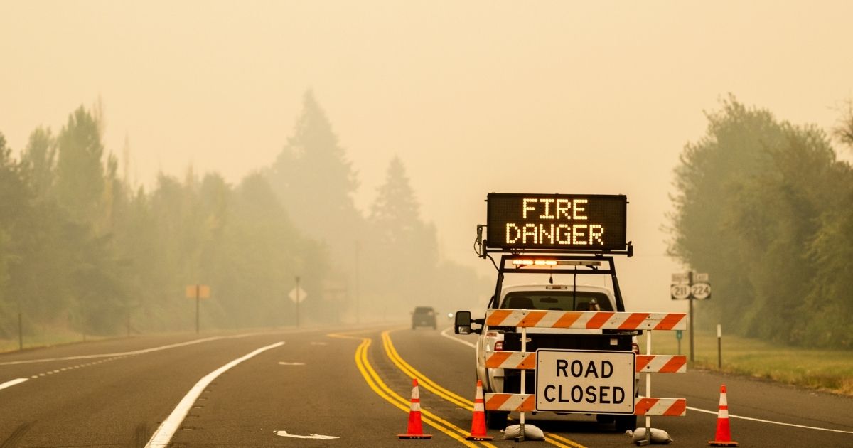 ESTACADA, OR - SEPTEMBER 10: A sign warning of impending fire danger is posted on September 10, 2020 in Estacada, Oregon. Multiple wildfires grew by hundreds of thousands of acres Thursday, prompting large-scale evacuations throughout the state.