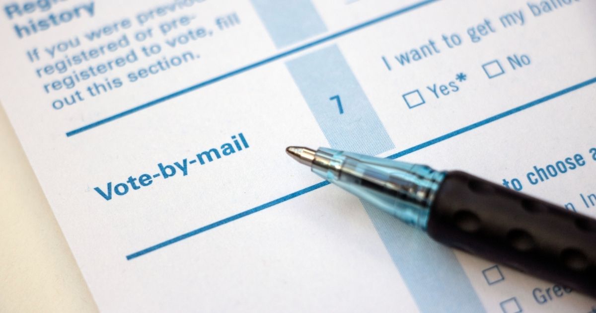 A voter registration form is seen in the stock image above.