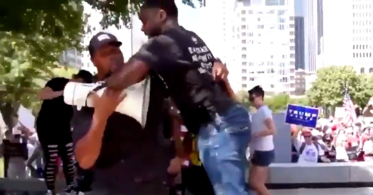 Things get physical at a #WalkAway rally in Dallas.