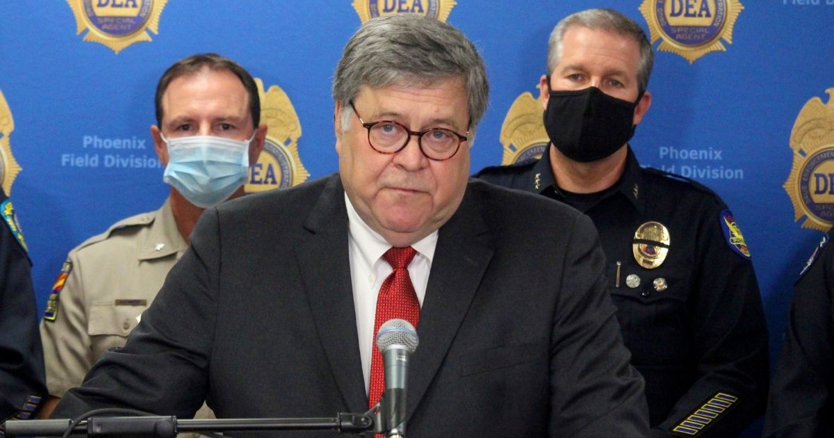 Attorney General William Barr speaks at a news conference on Sept. 10, 2020, in Phoenix, where he announced results of a crackdown on international drug trafficking.