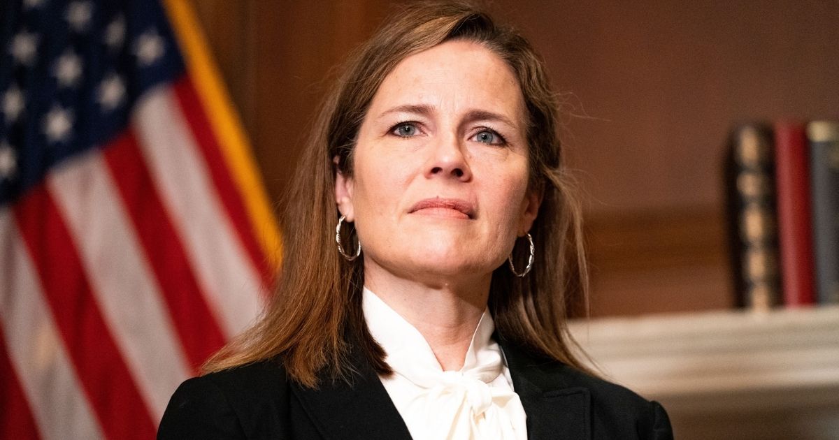 Judge Amy Coney Barrett, President Donald Trump's nominee for the Supreme Court, poses for a photo at the United States Capitol in Washington, D.C., on Oct. 1, 2020.