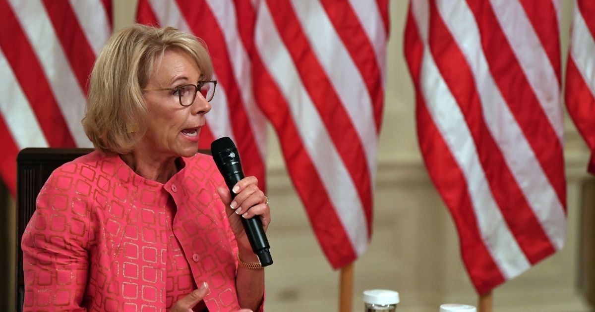 Secretary of Education Betsy DeVos speaks in the White House in Washington, D.C., on Aug. 12, 2020.