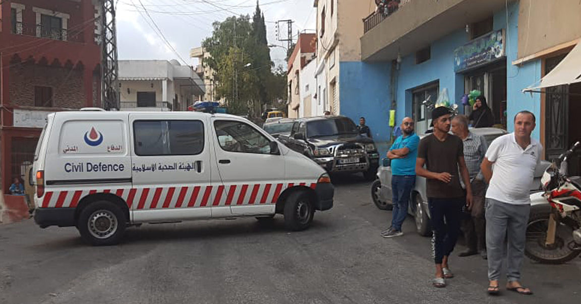 A Hezbollah ambulance blocks a road that leads to the site of an explosion in the village of Ain Qana, Lebanon, on Sept. 22, 2020.