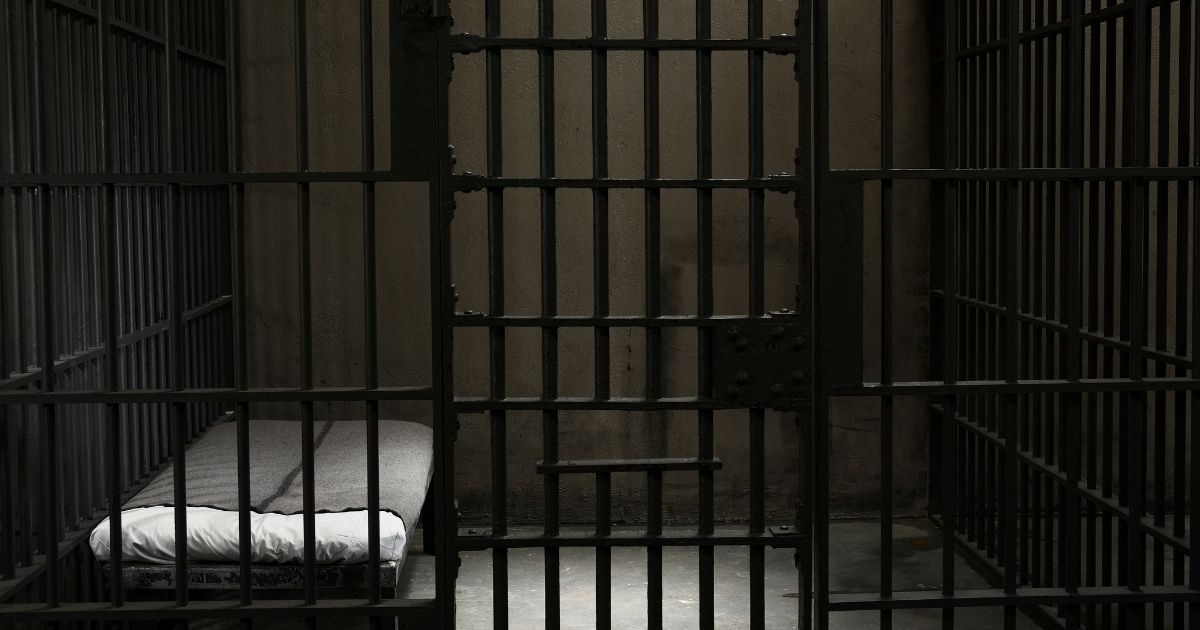 An empty jail cell is seen in this stock image.