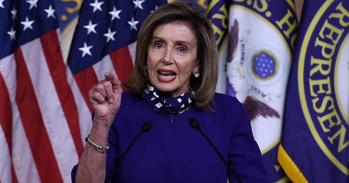 Speaker of the House Nancy Pelosi speaks to reporters during her weekly news conference at the US Capitol on Aug. 27, 2020, in Washington, D.C.