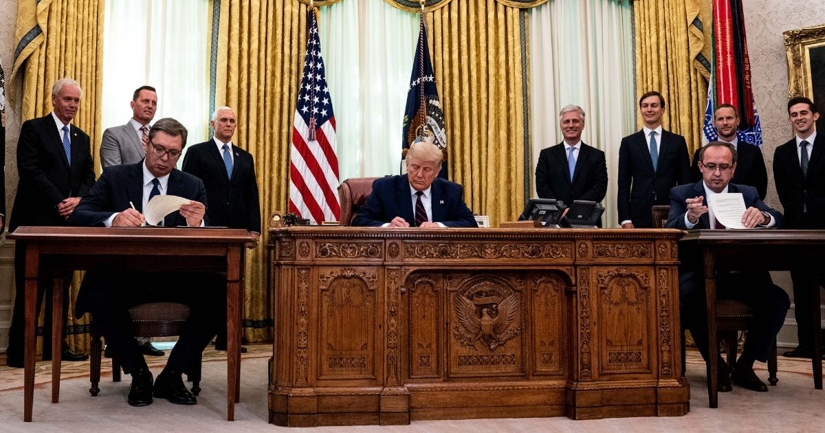 President Donald Trump participates in a signing ceremony and meeting with the President of Serbia Aleksandar Vucic, left, and the Prime Minister of Kosovo Avdullah Hoti, right, in the Oval Office of the White House on Sep. 4, 2020, in Washington, D.C.