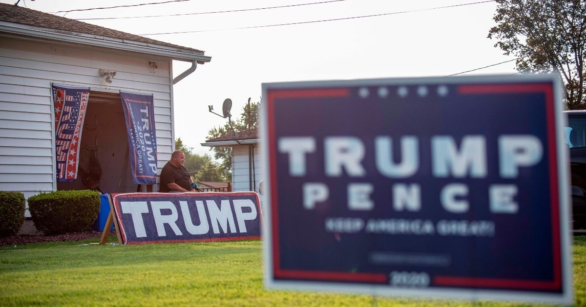 Former Democratic voter and now fervent Trump supporter David Mitchko sits outside his home on Aug. 11, 2020, in Olyphant, Pennsylvania.