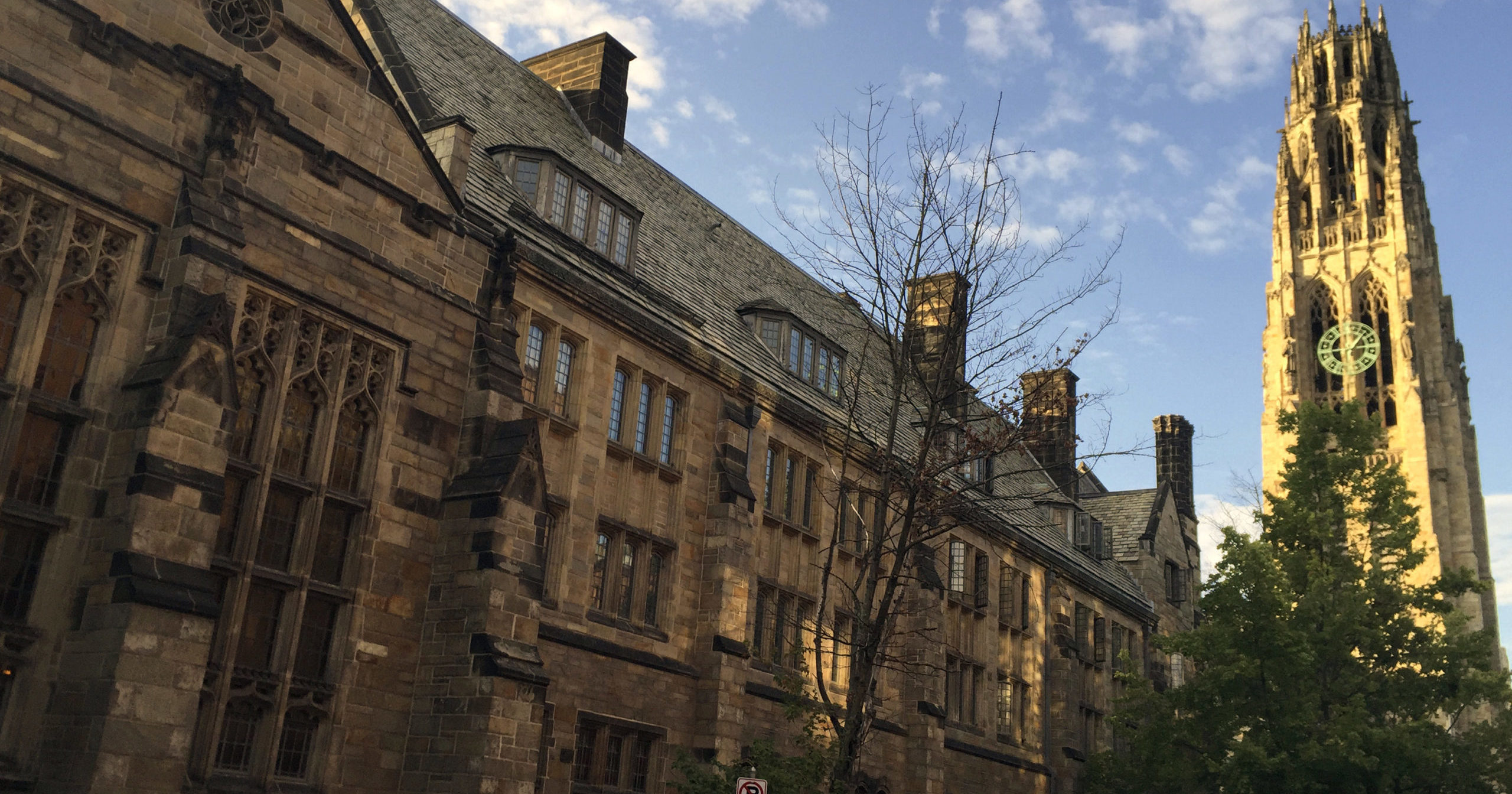 This Sept. 9, 2016, photo shows Harkness Tower on the campus of Yale University in New Haven, Conn. A Justice Department investigation has found Yale University is illegally discriminating against Asian-American and white applications, in violation of federal civil rights law, officials said Thursday.