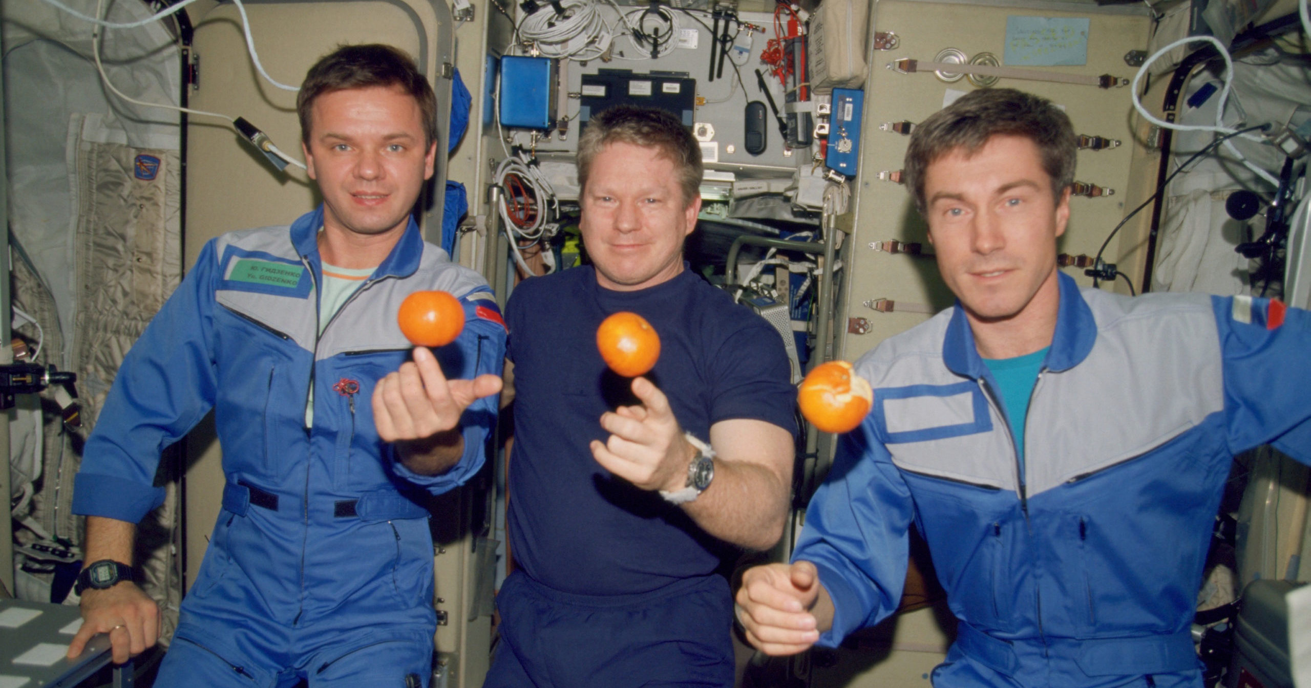 In this photo provided by NASA, Yuri Gidzenko, Bill Shepherd and Sergei Krikalev pose on board the International Space Station on Dec. 4, 2000.