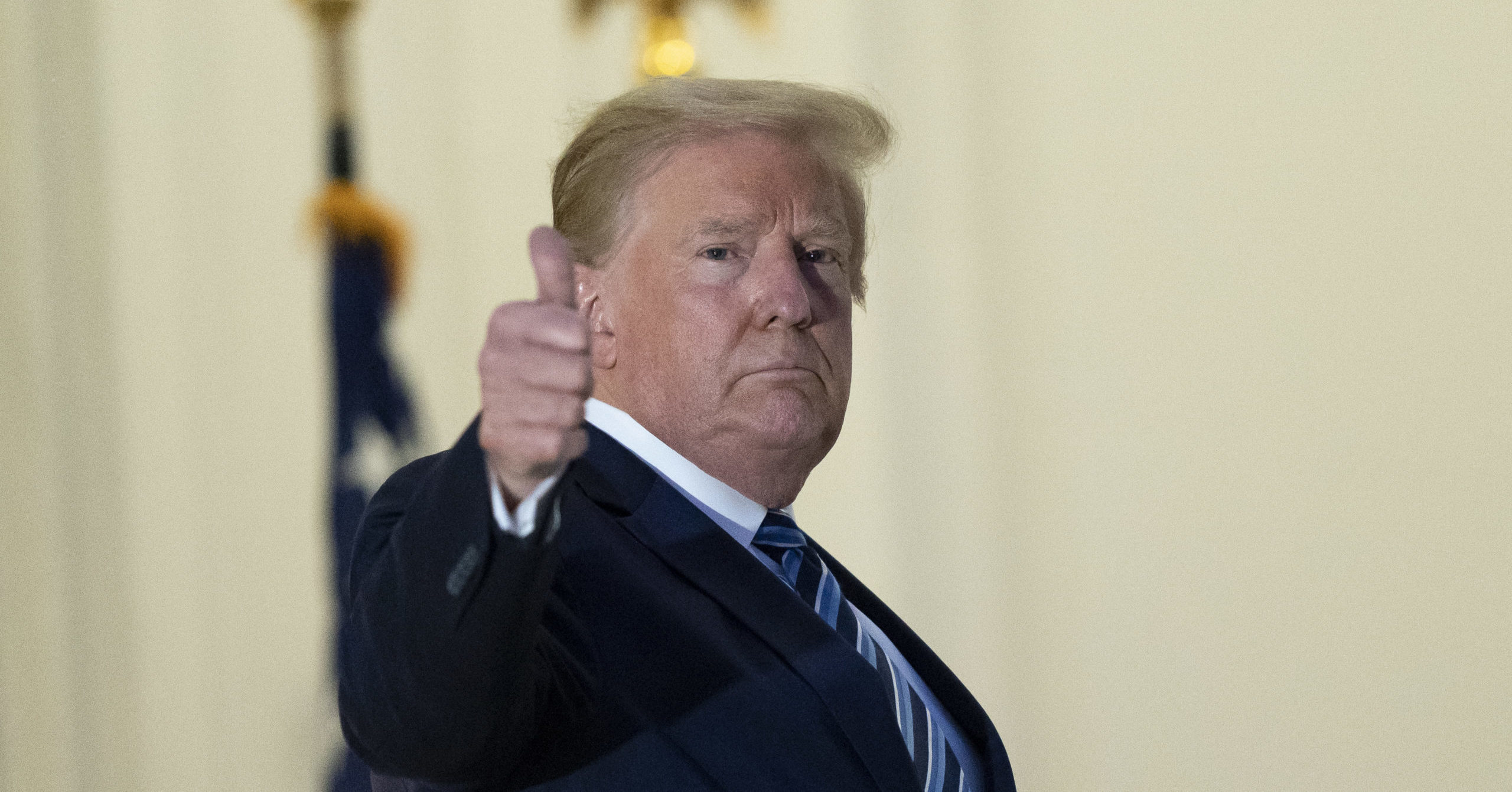 President Donald Trump gives thumbs up upon returning to the White House on Oct. 5, 2020, in Washington, D.C., after leaving Walter Reed National Military Medical Center. Trump announced he tested positive for COVID-19 on Oct. 2.