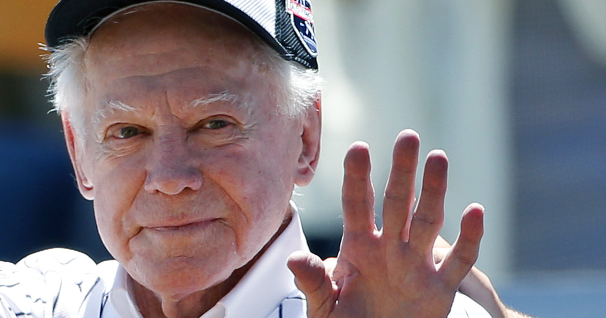 In this June 12, 2016, file photo, former New York Yankees pitcher Whitey Ford waves to fans from outside the dugout at the Yankees' annual Old Timers Day baseball game in New York. Ford died at his Long Island home on Oct. 8, 2020.