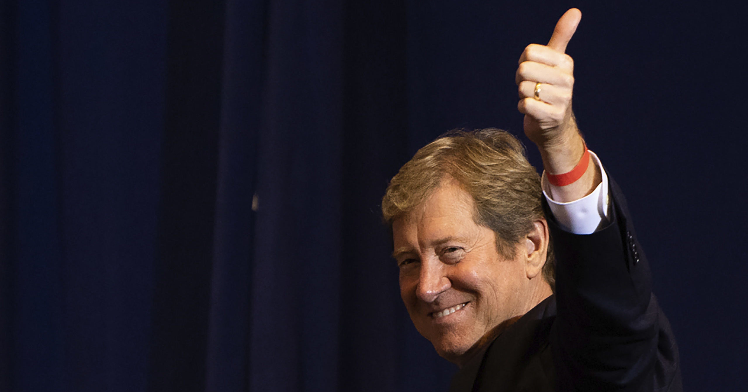 Republican Senate candidate Jason Lewis of Minnesota stands after being recognized by Vice President Mike Pence at Minneapolis-St. Paul International Airport on Sept. 24, 2020.