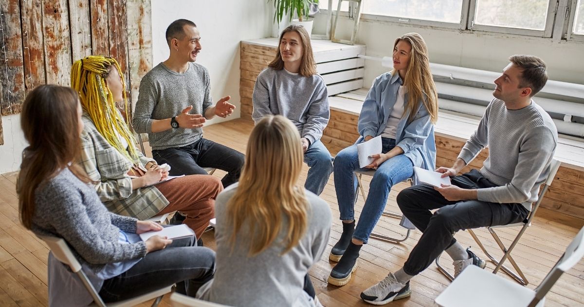 An alcoholics anonymous support group is seen in the stock image above.