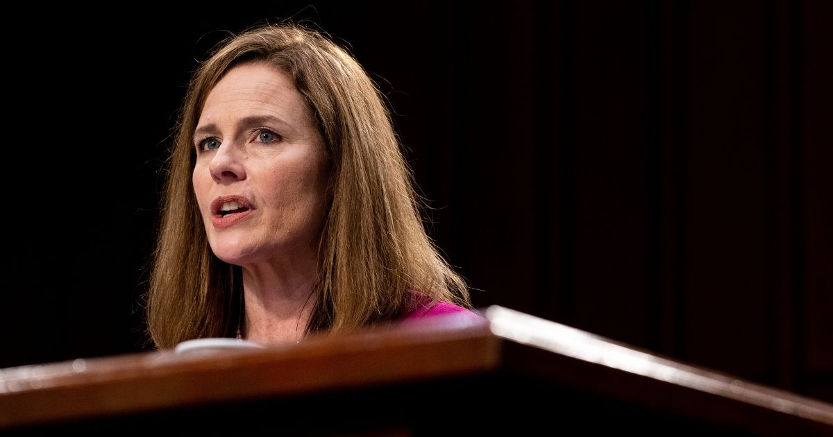 Supreme Court nominee Judge Amy Coney Barrett gives her opening statement during a Senate Judiciary Committee confirmation hearing on Monday.