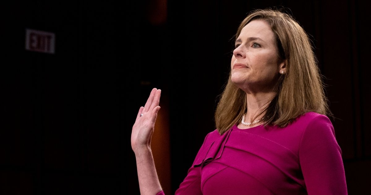 Supreme Court nominee Amy Coney Barrett is sworn in during her Senate Judiciary Committee confirmation hearing on Capitol Hill in Washington, D.C., on Monday.
