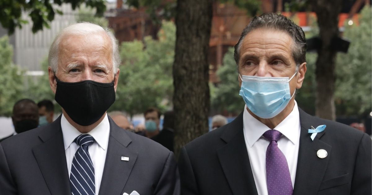 Democratic presidential nominee Joe Biden, left, and New York Gov. Andrew Cuomo attend a 9/11 memorial service.