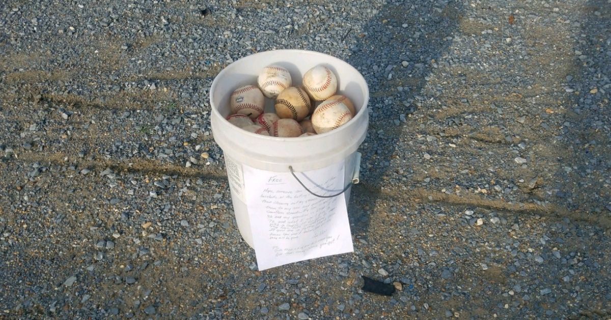 The bucket of free baseballs along with the touching note that Randy Long wrote.