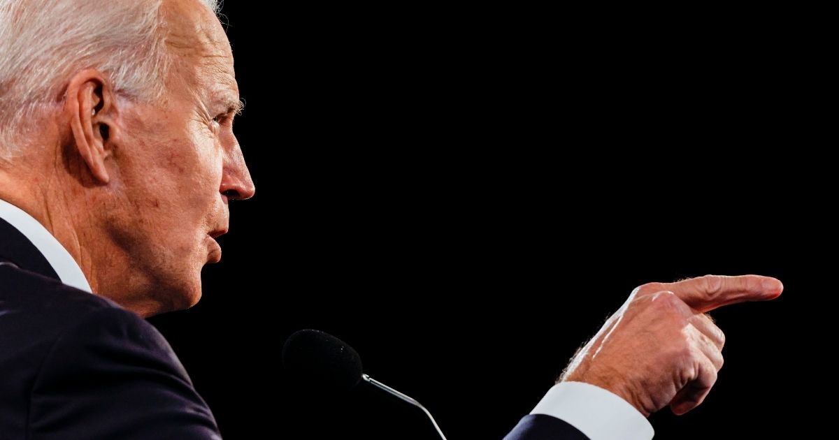 Democratic presidential nominee Joe Biden points at President Donald Trump during their debate Thursday night at Belmont University in Nashville, Tennessee.