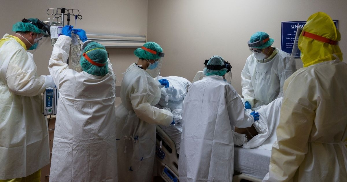 Members of the medical staff treat a patient in the COVID-19 intensive care unit at United Memorial Medical Center in Houston on July 2, 2020.
