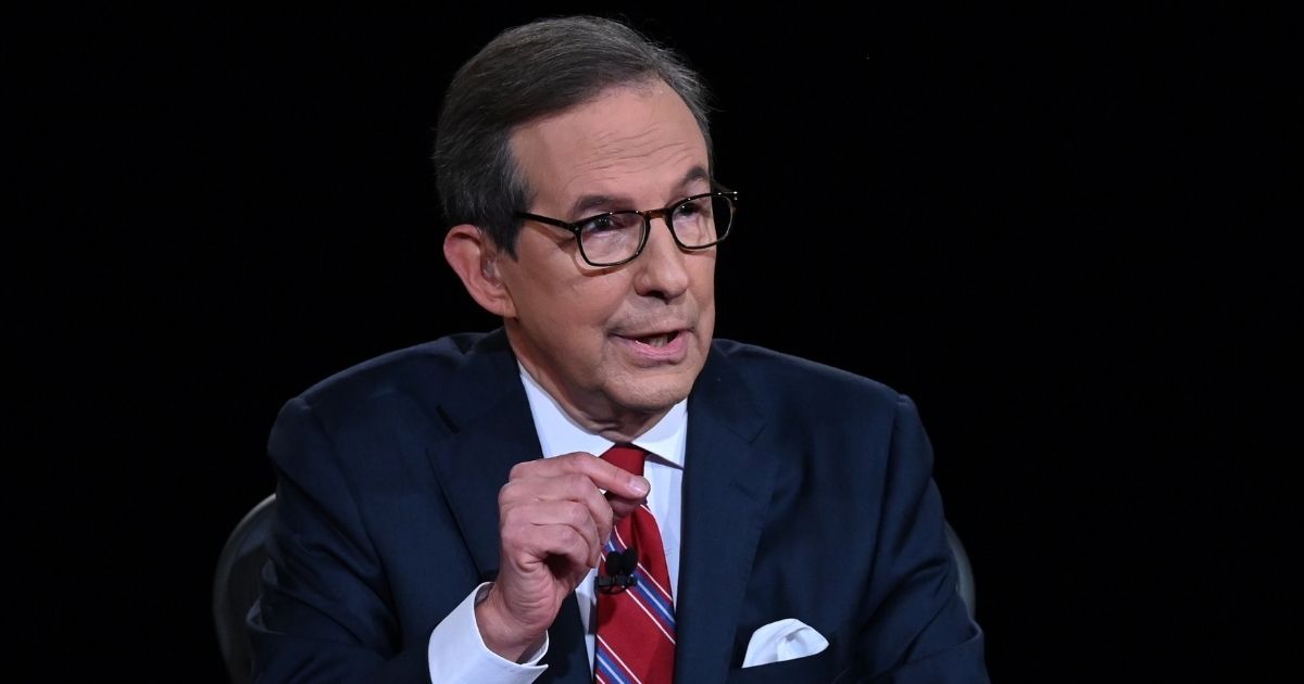 Fox News anchor Chris Wallace moderates the first presidential debate between President Donald Trump and Democratic presidential nominee Joe Biden at the Health Education Campus of Case Western Reserve University on Sept. 29, 2020, in Cleveland.