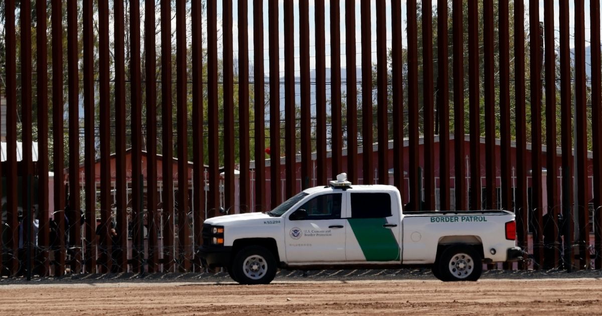 A Customs and Border Protection vehicle sits near the wall as President Donald Trump visits a new section of the border wall with Mexico in El Centro, California, on April 5, 2019.