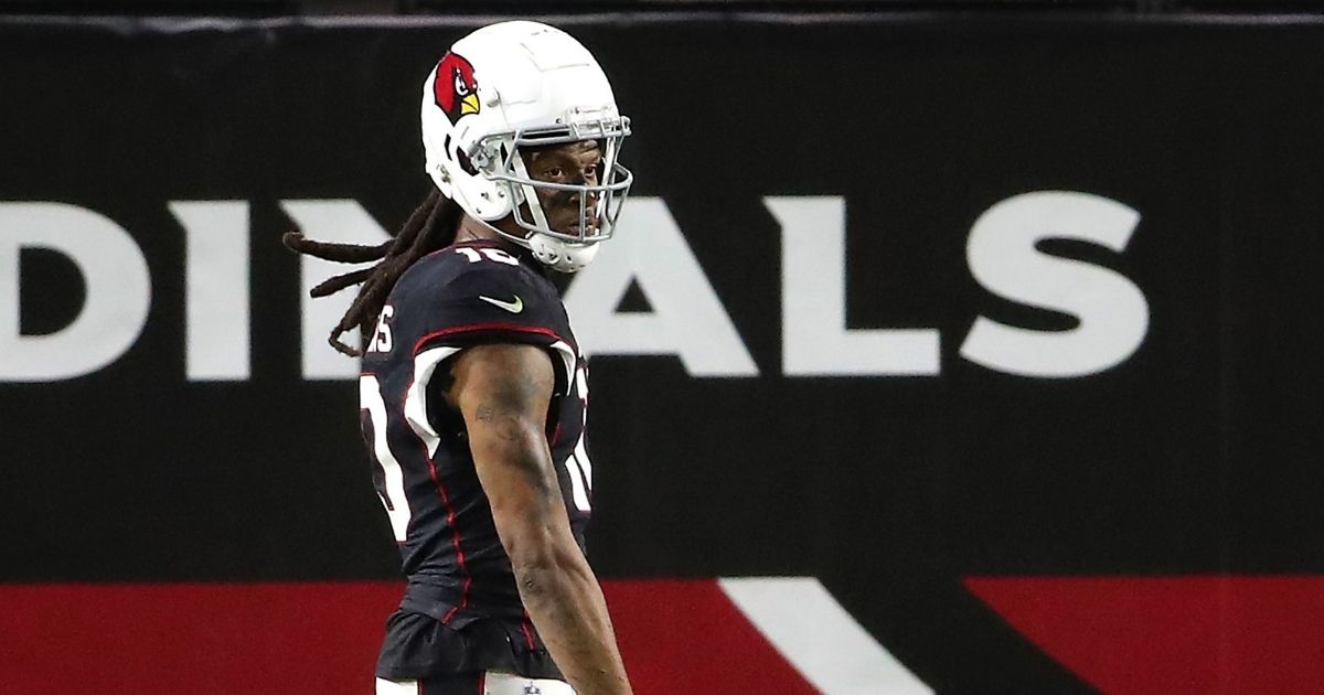 Wide receiver DeAndre Hopkins #10 of the Arizona Cardinals reacts after making a touchdown catch against the Seattle Seahawks in the first quarter of the game at State Farm Stadium on Oct. 25, 2020, in Glendale, Arizona.