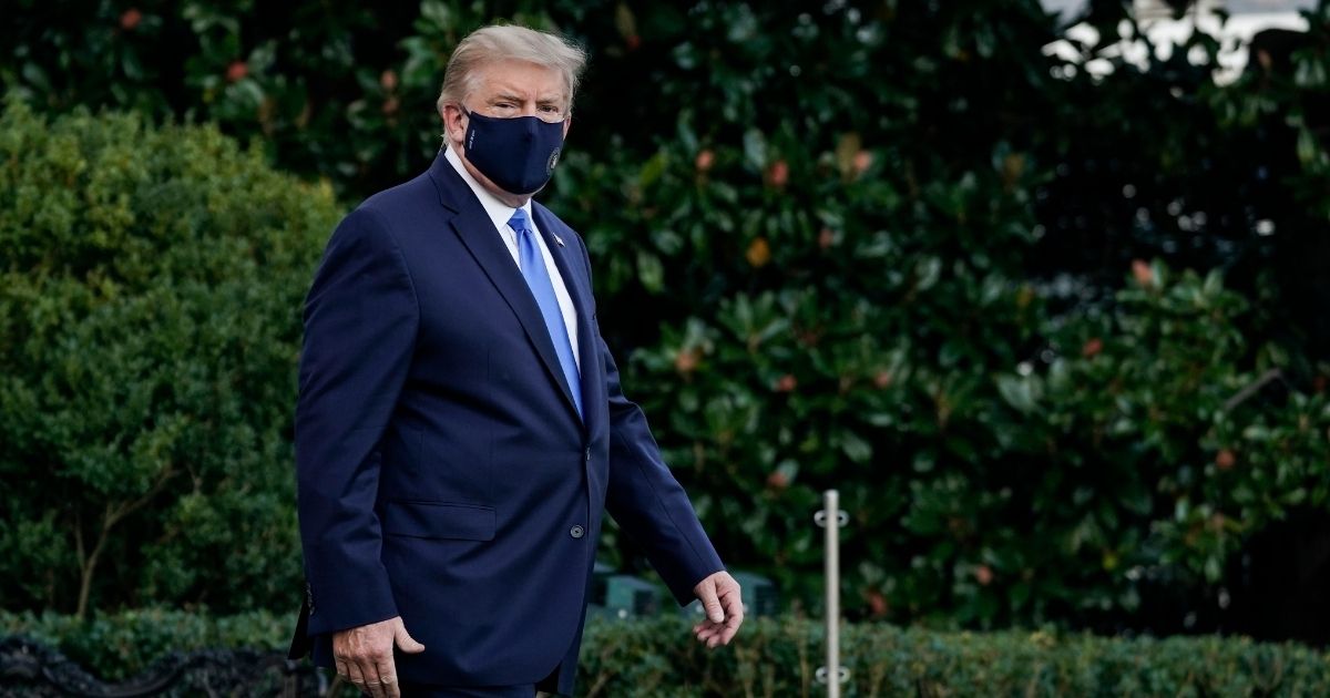 President Donald Trump leaves the White House for Walter Reed National Military Medical Center on the South Lawn of the White House on Oct. 2, 2020, in Washington, D.C.