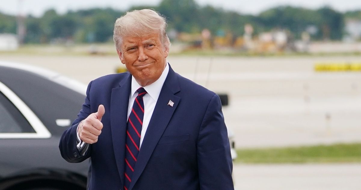 President Donald Trump gives the thumbs-up upon arrival at Cleveland Hopkins International Airport in Cleveland, Ohio, on Sept. 29, 2020.