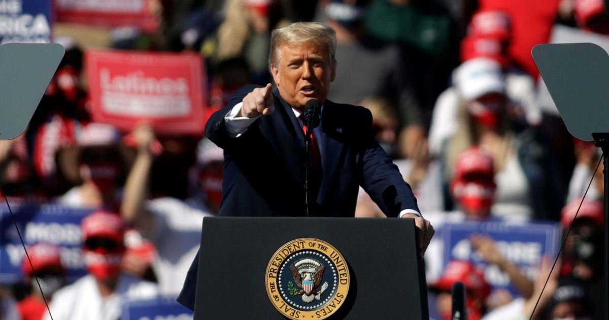 President Donald Trump speaks during a campaign rally Thursday in Bullhead City, Arizona.