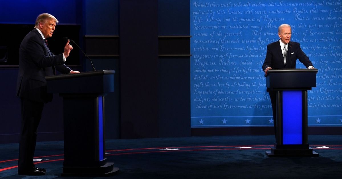 President Donald Trump, left, and Democratic presidential nominee and former Vice President Joe Biden speak Tuesday during the first presidential debate at the Case Western Reserve University and Cleveland Clinic in Cleveland, Ohio.
