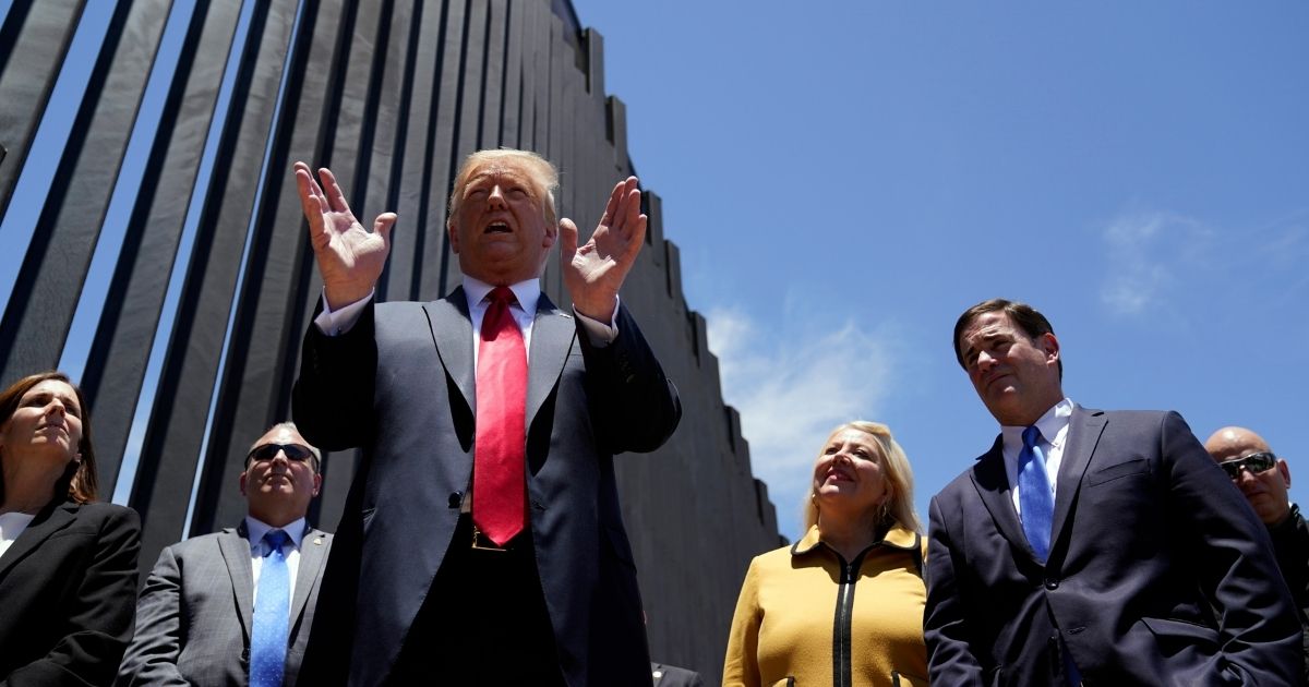 President Donald Trump speaks as he tours a section of the border wall on June 23, 2020, in San Luis, Arizona.