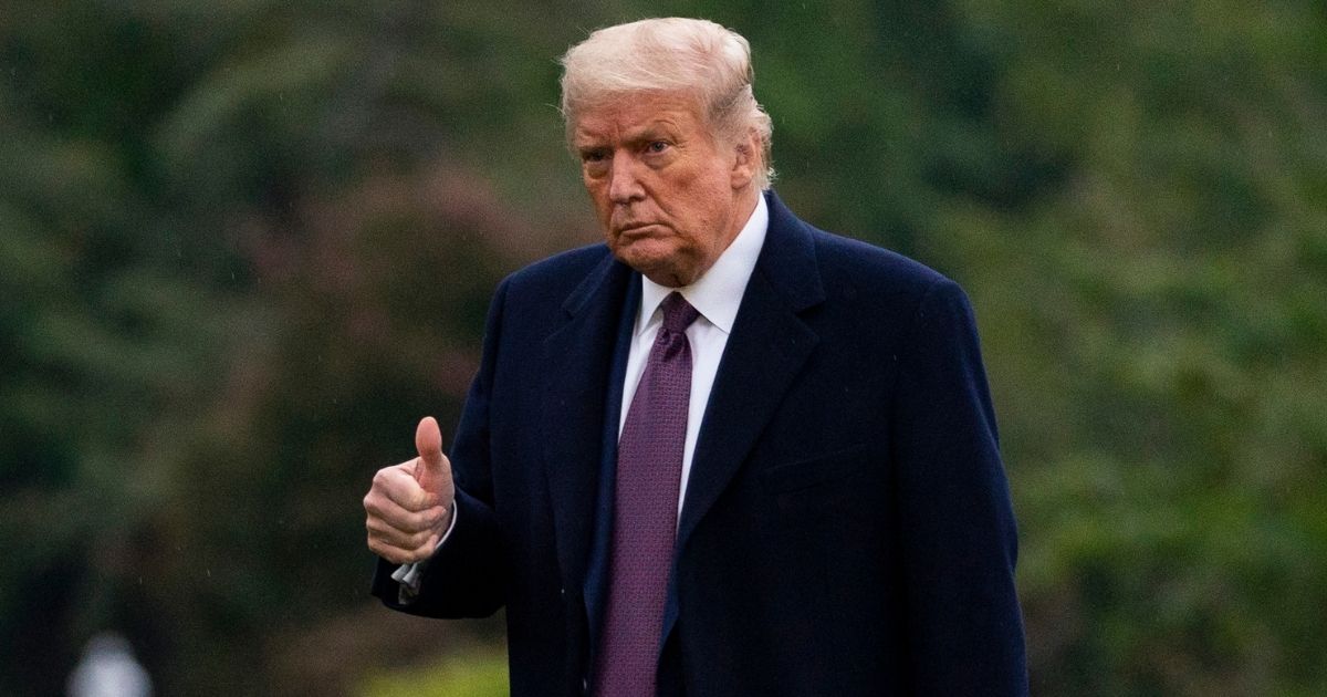 President Donald Trump gives the thumbs-up as he walks from Marine One to the White House in Washington, on Oct. 1, 2020.