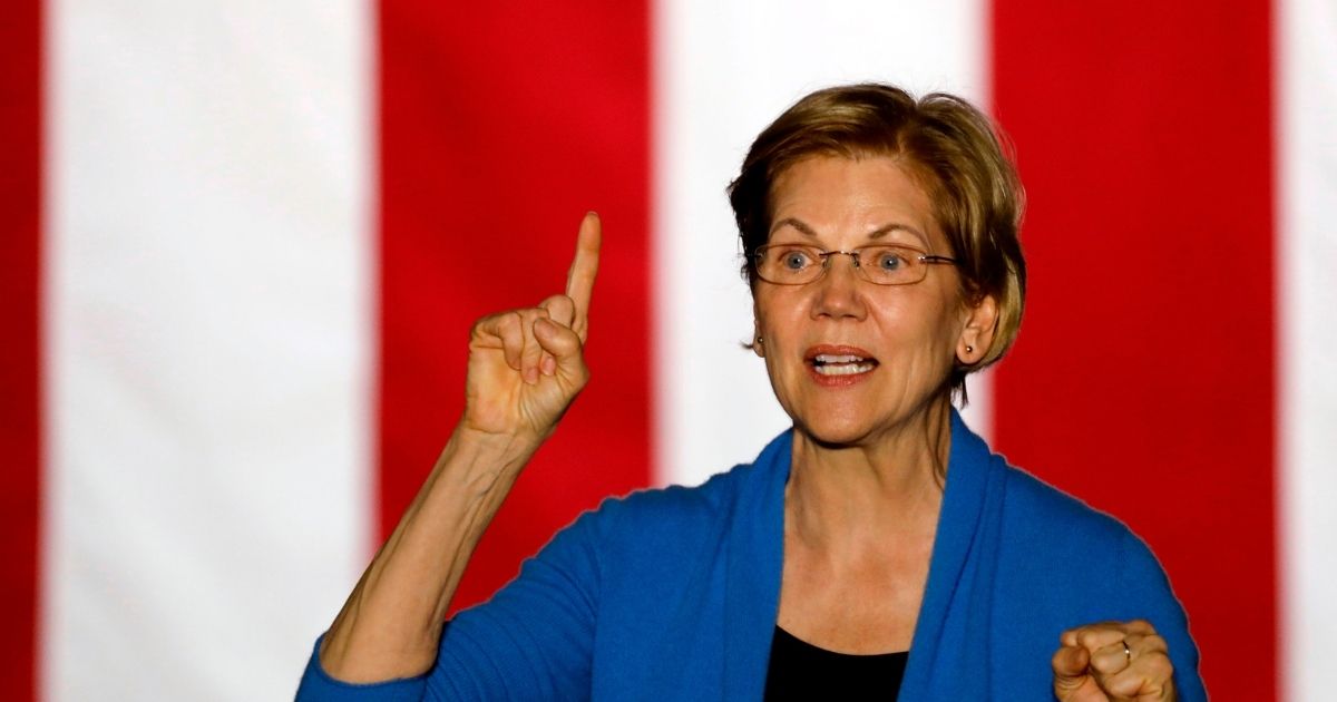 Democratic Sen. Elizabeth Warren of Massachusetts gestures as she speaks during a campaign rally at Eastern Market in Detroit on March 3, 2020.