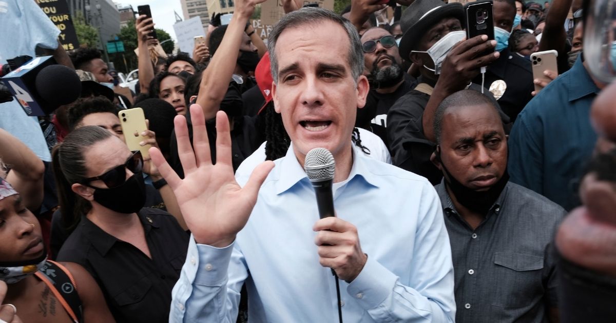 Los Angeles Mayor Eric Garcetti tries to talk to Black Lives Matter protesters in downtown Los Angeles on June 2, 2020.