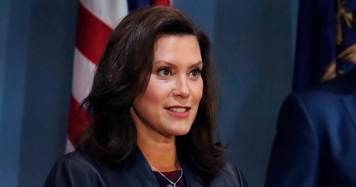 In a photo provided by the Michigan Office of the Governor, Gov. Gretchen Whitmer addresses the state during a speech in Lansing on Sept. 2, 2020.