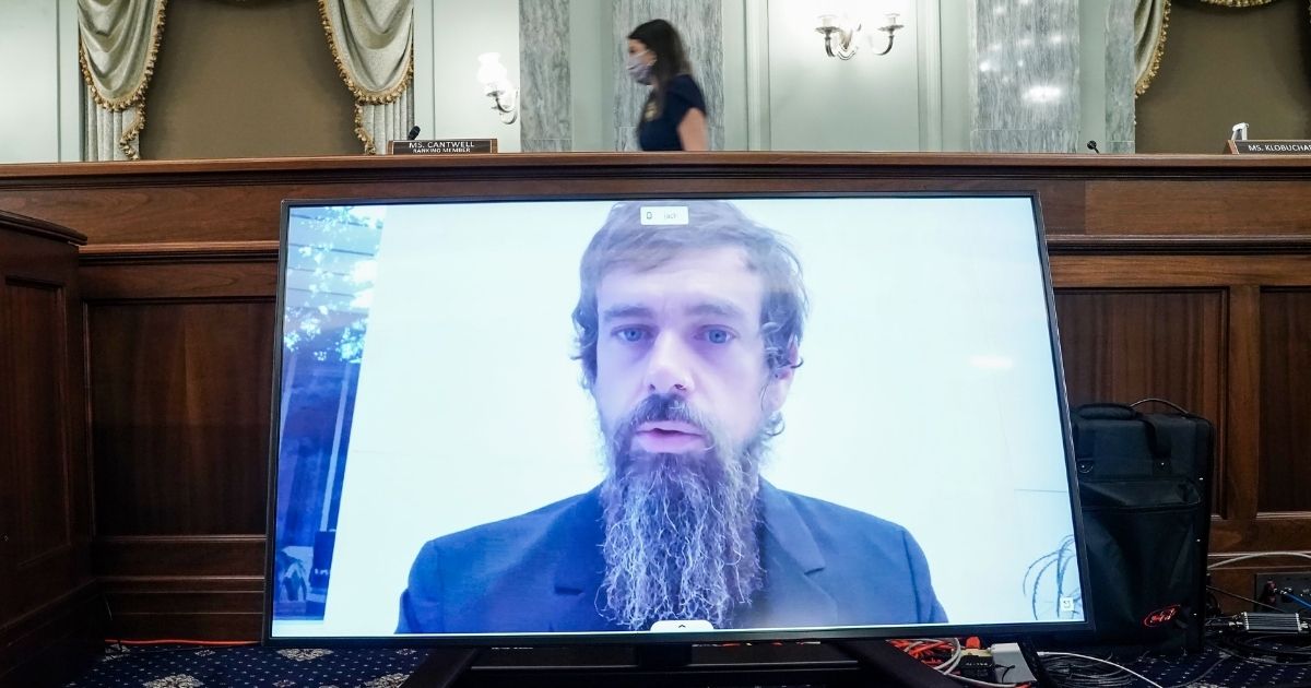 Twitter CEO Jack Dorsey gives his opening statement remotely during a Senate hearing Wednesday in Washington.