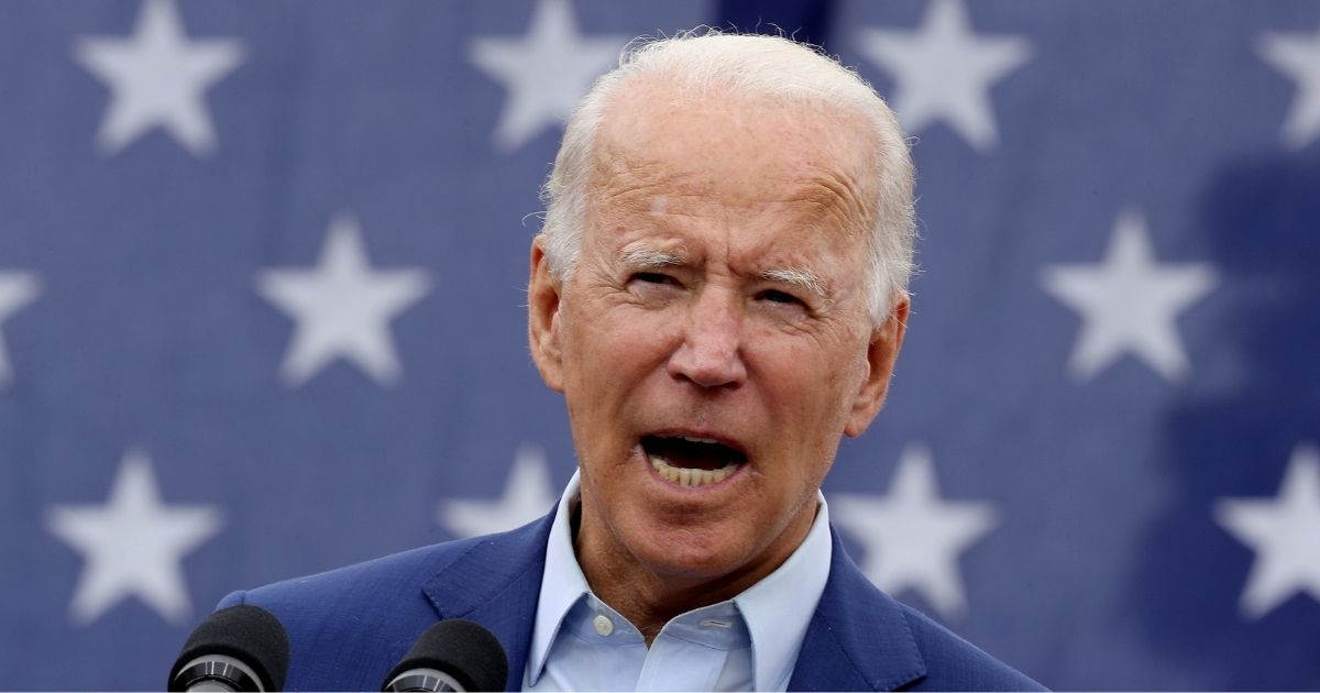 Then-Democratic presidential nominee Joe Biden delivers remarks in the parking lot outside the United Auto Workers Region 1 offices in Warren, Michigan, on Sept. 9, 2020.