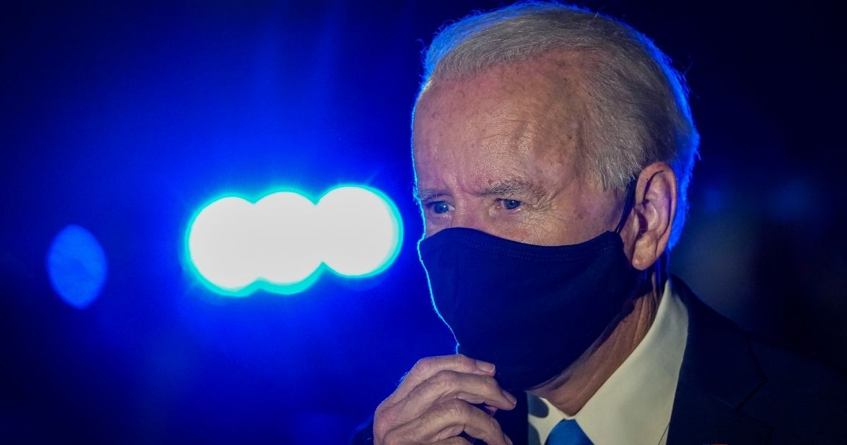 Democratic presidential nominee Joe Biden speaks to reporters before boarding his campaign plane at Nashville International Airport in Nashville, Tennessee, on Thursday.